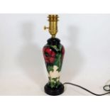 A Moorcroft pottery lamp base approx.13.25in of fl