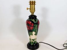 A Moorcroft pottery lamp base approx.13.25in of fl
