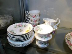 Eighteen pieces of Royal Albert Moss Rose tea ware