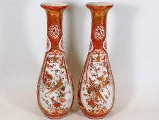 A pair of 19thC. Japanese Kutani vases depicting b