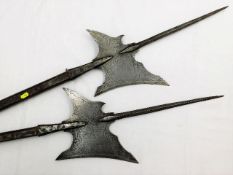 Two continental halberds each approx. 66in long