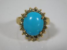 An 18ct (tested) gold ring of 6.6g set with turquoise & diamonds approx. 0.5ct