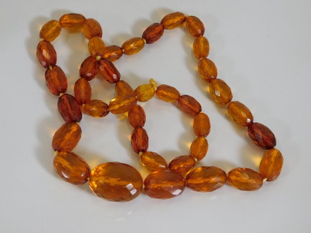 A set of Victorian faceted amber beads