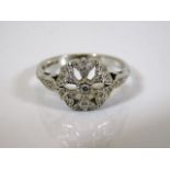 A 9ct white gold ring set with small diamonds