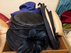 A boxed quantity of ladies straw hats