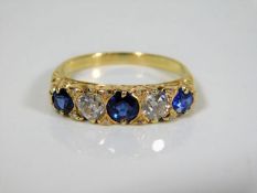 An 18ct gold ring set with half a carat of diamond