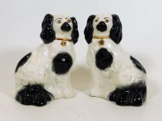 A pair of Beswick mantlepiece sheepdogs