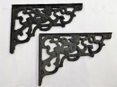 A pair of Victorian cast iron sink brackets approx