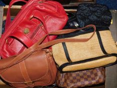 A boxed quantity of handbags