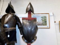An Italian suit of armour including gloves with pl