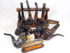 A selection of various pipes, a stand & other item