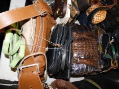 A collection of ten handbags including Bruno Magli