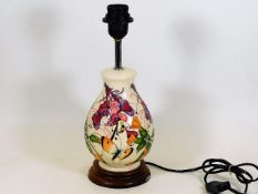 A Moorcroft pottery lamp base approx. 13.25in of f