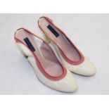 A pair of Tommy Hilfiger shoes given to vendor by