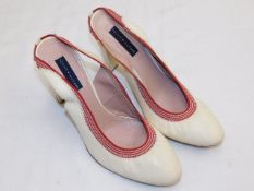 A pair of Tommy Hilfiger shoes given to vendor by