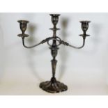 A silver candelabra 15.5in high with 14in span