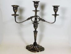 A silver candelabra 15.5in high with 14in span