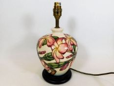 A Moorcroft pottery lamp base approx. 11.5in with