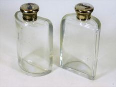 A pair of antique silver topped Brandy & Whisky de