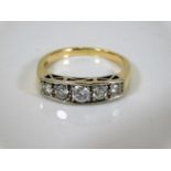 A ladies 18ct gold five stone diamond ring, approx