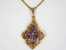 A 9ct gold chain & pendant set with amethyst & a s