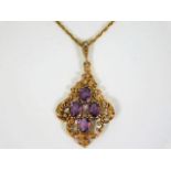 A 9ct gold chain & pendant set with amethyst & a s
