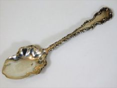 A decorative silver spoon
