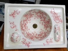A 19thC. pink transferware bathroom sink
