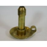 A trench art brass sprung candleholder