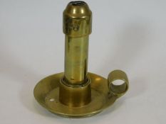 A trench art brass sprung candleholder