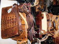 A collection of ten handbags including crocodile &