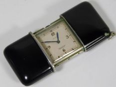 A Movado slide watch