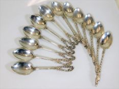 Six decorative silver spoons twinned with six simi