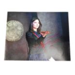 A hand signed Jenna Coleman, actor photograph as a