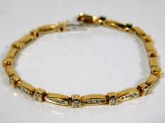 An 18ct gold & diamond bracelet 18.1g approx. 84 d
