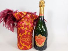 A bottle of Tsarine champagne with decorative case