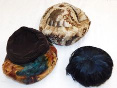 A Reslaw velvet hat trimmed with pheasant feathers