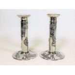 A pair of Wang Hing Chinese silver candlesticks de