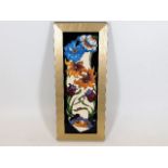 A Moorcroft pottery Rachel Bishop framed tile appr