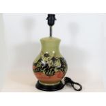 A Moorcroft pottery lamp base approx. 15.125in of