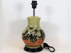 A Moorcroft pottery lamp base approx. 15.125in of