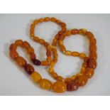 A Victorian set of amber beads approx. 37g