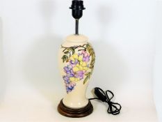 A Moorcroft pottery lamp base approx. 16.25in of f