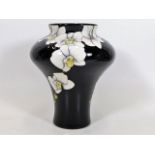 A Moorcroft pottery Moth Orchid vase by Anji Daven