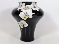 A Moorcroft pottery Moth Orchid vase by Anji Daven