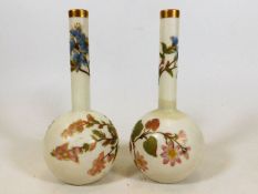 A pair of Royal Worcester vases, one restored