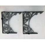 A pair of Victorian cast iron brackets approx 16.2