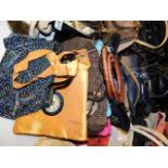 A collection of ten handbags