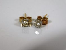 A small set of 9ct gold & diamond stud earrings
