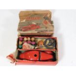 A Schuco tinplate steering car with accessories &